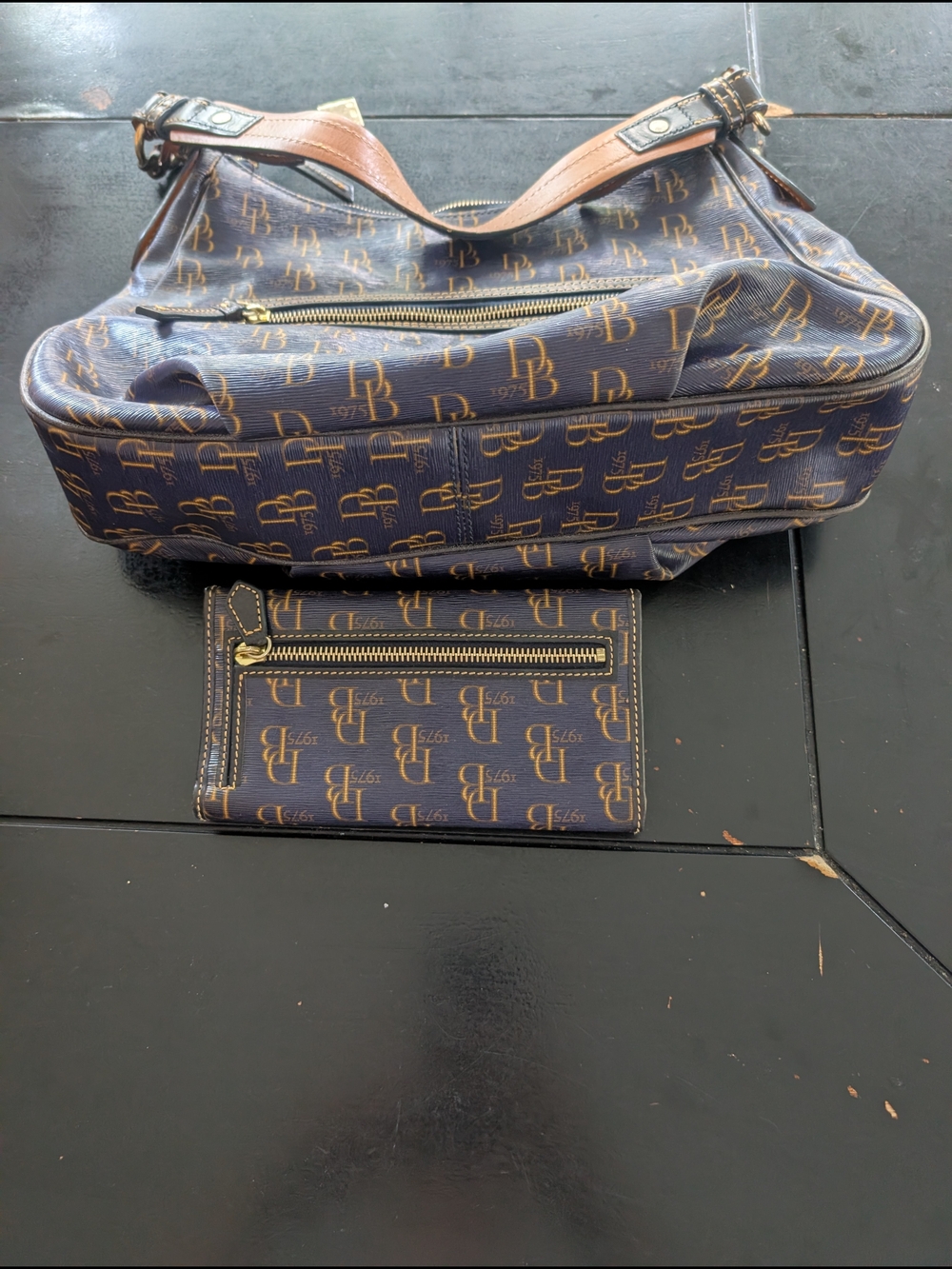 Dooney & Bourke Tan and Black Folded Leather Wallet